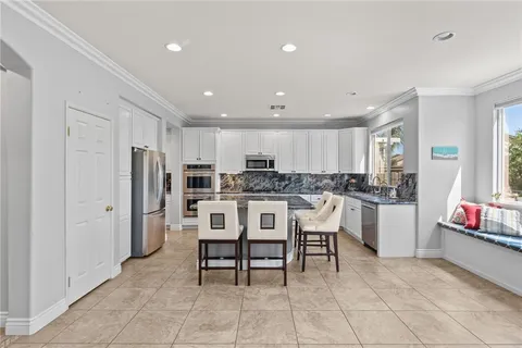 a bedroom with a bed and a fireplace