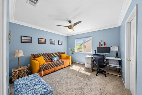 a spacious bathroom with a tub sink and mirror