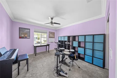 a view of a patio with couches table and chairs and potted plants