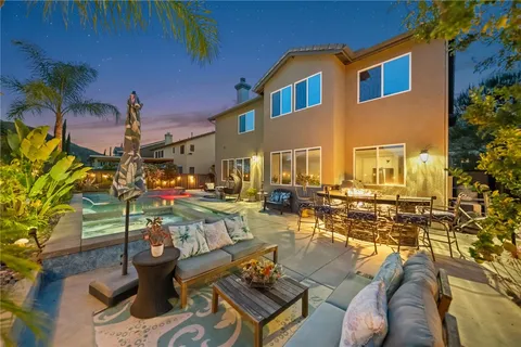 a backyard of a house with seating space