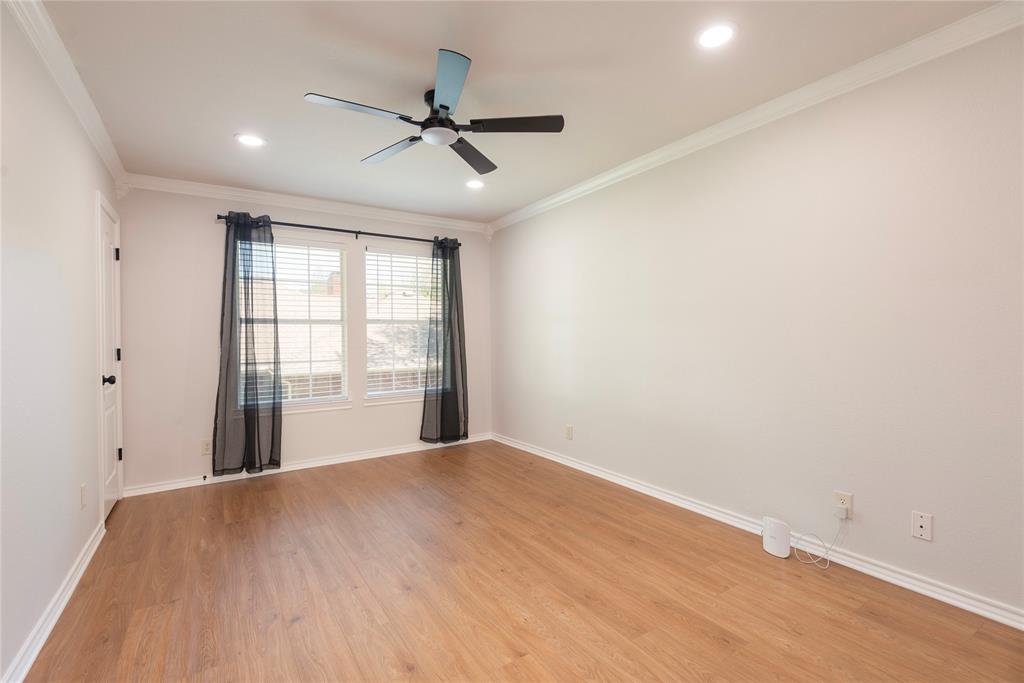 2020 Arbor Bend Road Bonham, TX 75418 - Photo 22 of 40 Spare room with crown molding, a ceiling fan, light wood-type flooring, and recessed lighting