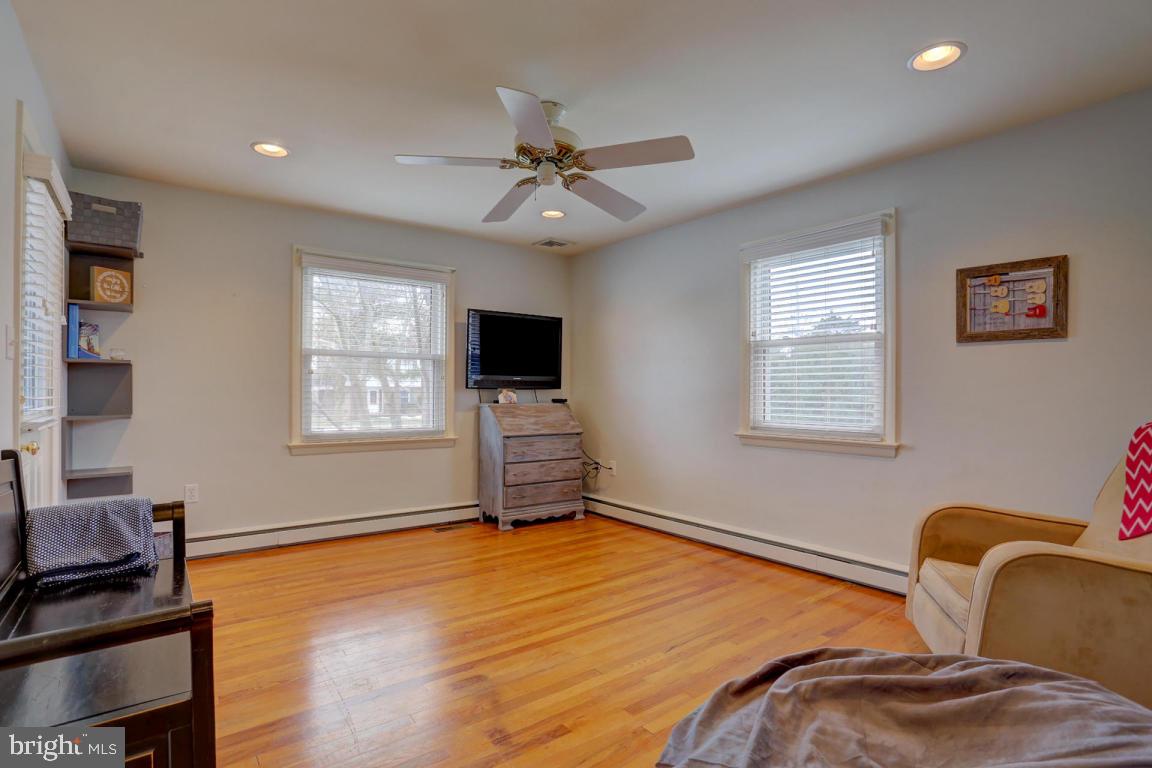 249 East Oregon Road Lititz, PA 17543 - Photo 11 of 30 a living room with furniture and a flat screen tv