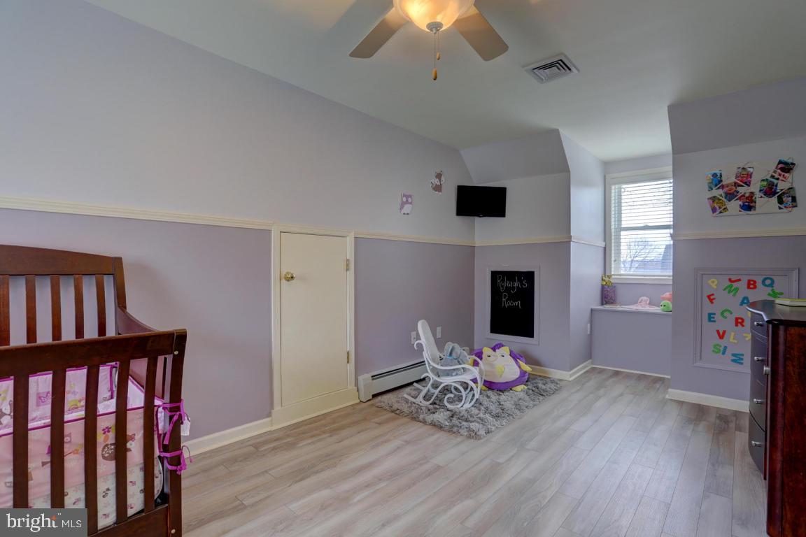 249 East Oregon Road Lititz, PA 17543 - Photo 16 of 30 a living room with furniture wooden floor and a fireplace