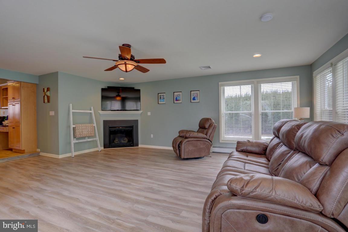 249 East Oregon Road Lititz, PA 17543 - Photo 22 of 30 a living room with furniture and a fireplace