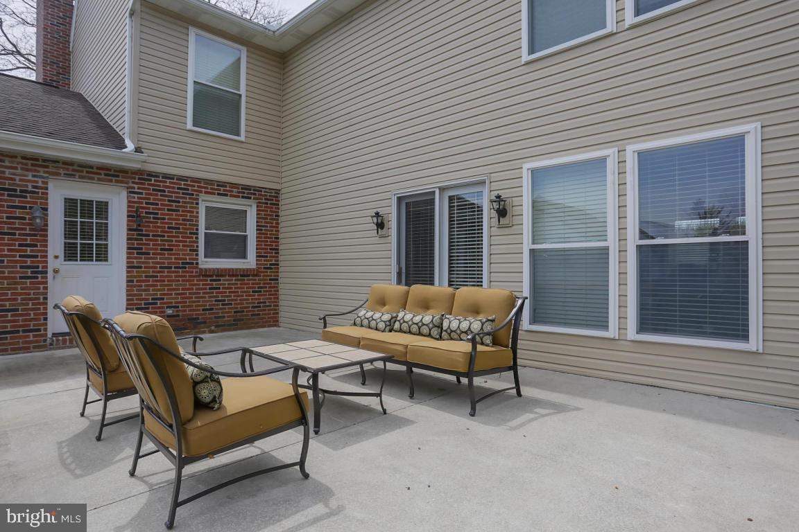 249 East Oregon Road Lititz, PA 17543 - Photo 25 of 30 a backyard of a house with outdoor seating