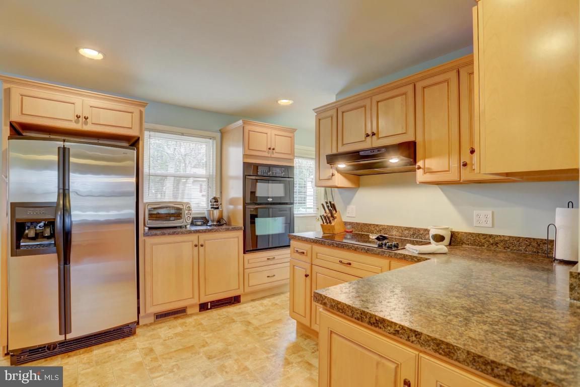 249 East Oregon Road Lititz, PA 17543 - Photo 8 of 30 a kitchen with a refrigerator sink and cabinets