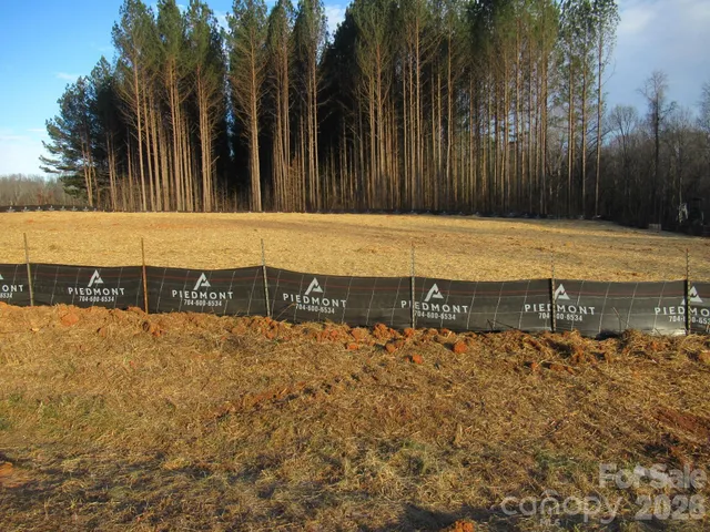 a view of a backyard of the house