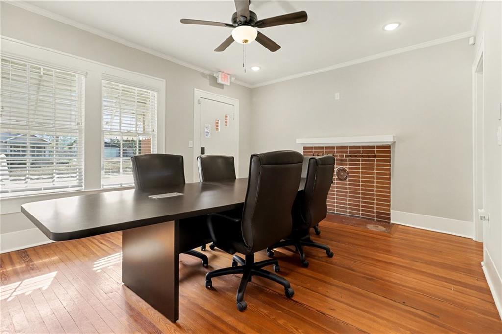 109 Stockbridge Road Jonesboro, GA 30236 - Photo 5 of 16 a view of a workspace with furniture and a window