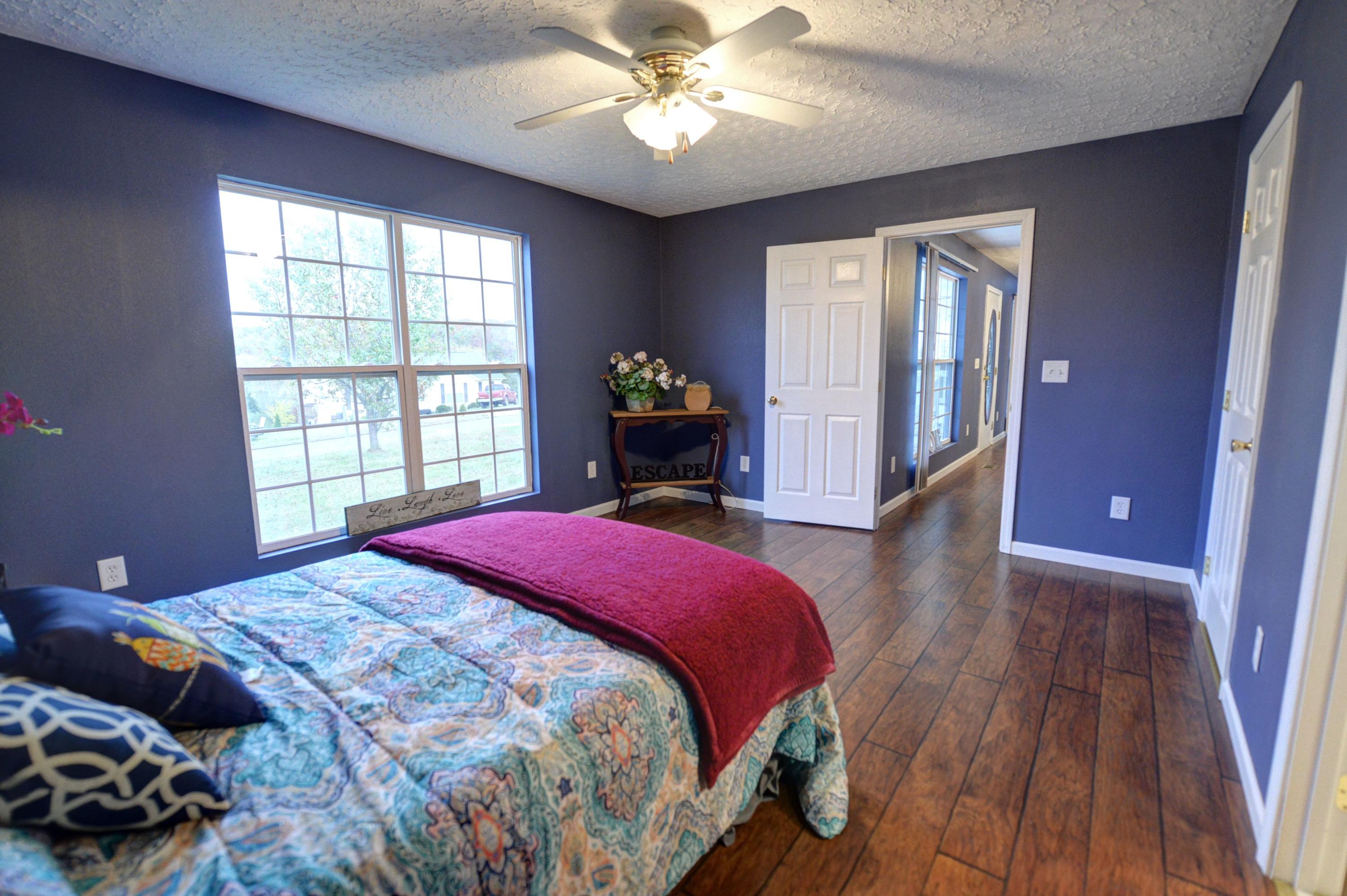 219 Oak Hill Estate Road Dayton, TN 37321 - Photo 14 of 32 14-219 Oak Hill Master Bed 4
