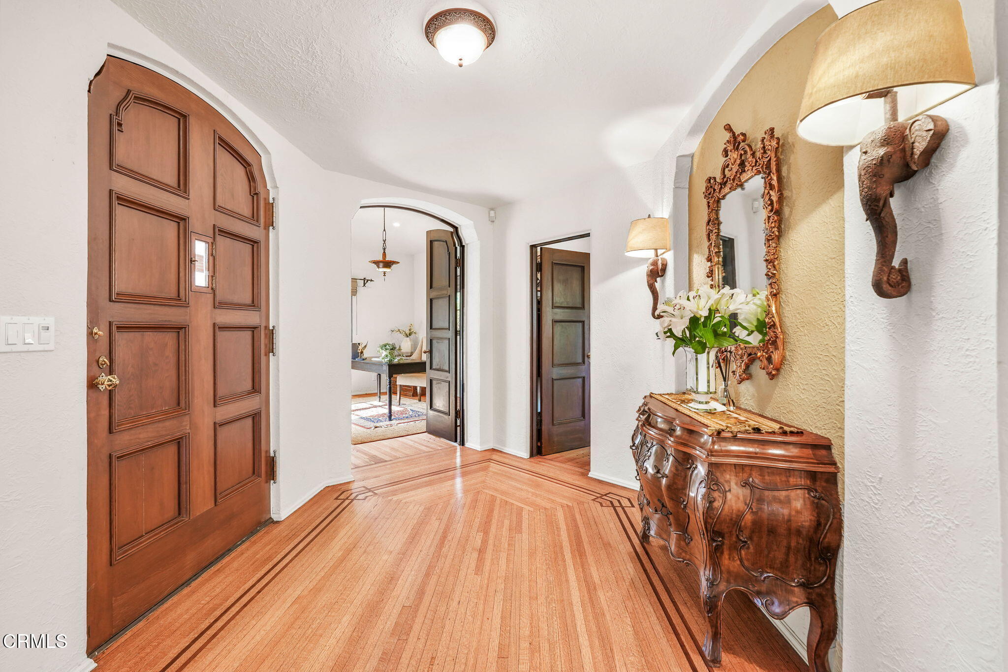 424 Ninita Parkway Pasadena, CA 91106 - Photo 11 of 57 a bedroom with a bed and a mirror