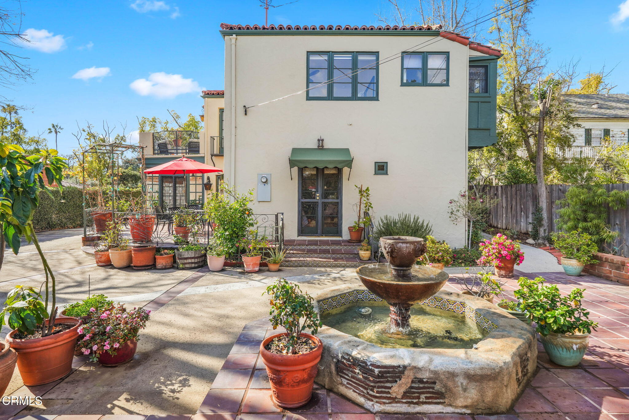 424 Ninita Parkway Pasadena, CA 91106 - Photo 55 of 57 a view of a patio with couches and potted plants