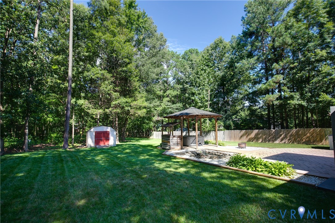 3114 Shiloh Church Road Midlothian, VA 23112 - Photo 29 of 34 Expansive backyard oasis featuring a manicured law