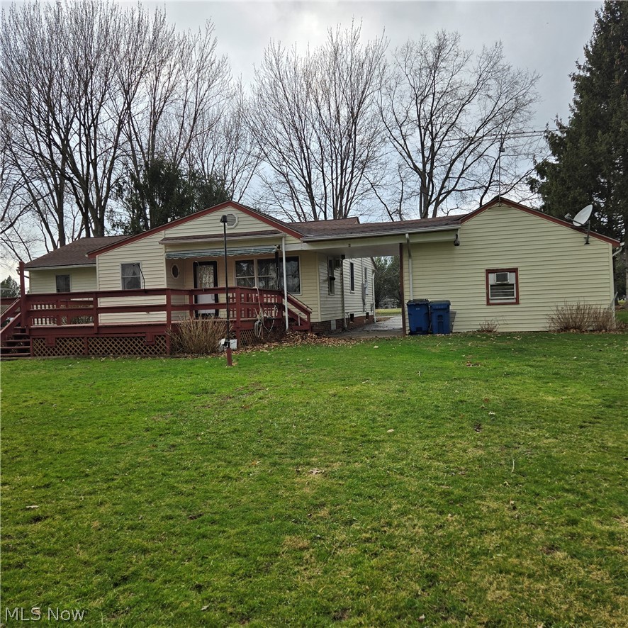 38700 Johnnycake Ridge Road Willoughby, OH 44094 - Photo 23 of 34 HUGE DECK. GREAT BACK YARD. REAR ADDITION BEHIND 2 CAR GARAGE WITH ADDITIONAL DOOR.