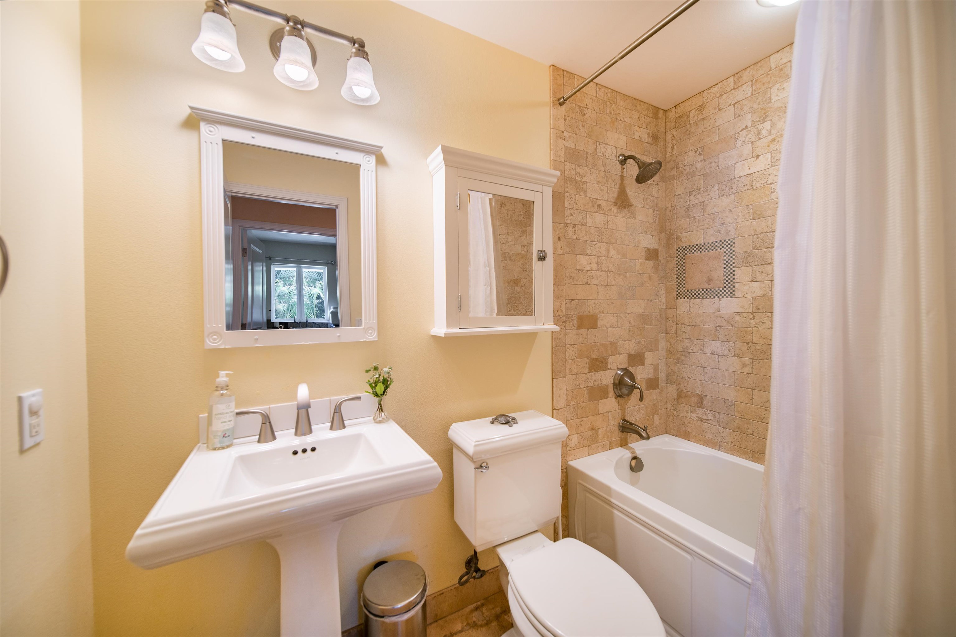 240 Kulamanu Circle Kula, HI 96790 - Photo 24 of 30 a bathroom with a sink toilet and shower