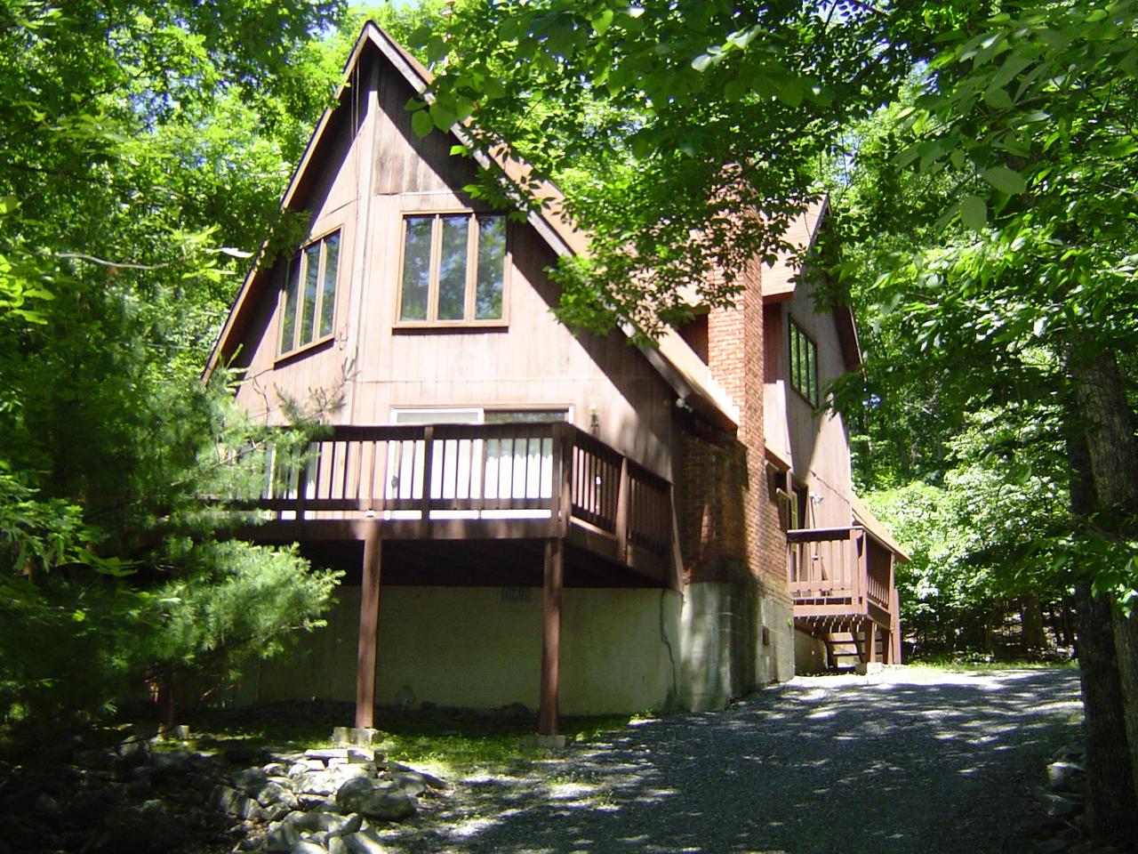 692 Decker Road Bushkill, PA 18324 - Photo 1 of 10 a view of a house with a yard