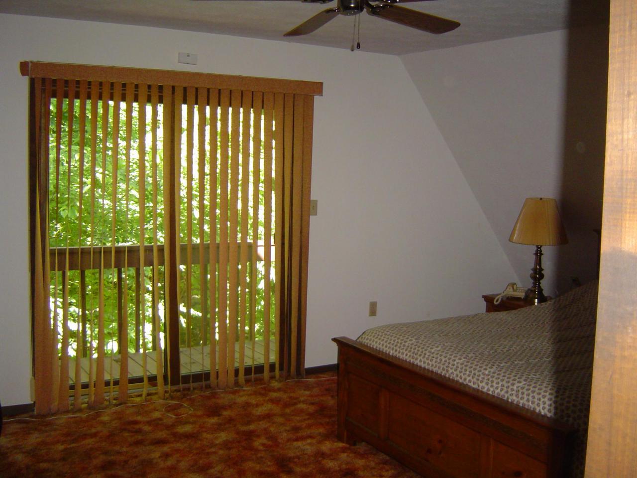 692 Decker Road Bushkill, PA 18324 - Photo 7 of 10 a view of a room with a floor to ceiling window