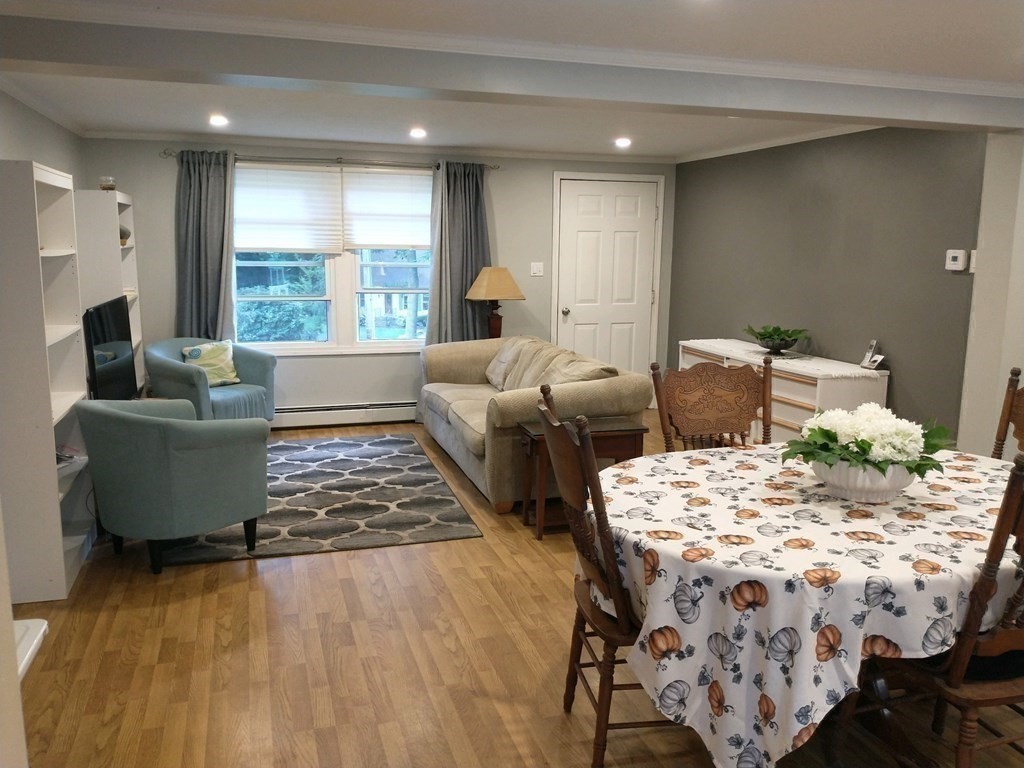 46 Apple Road Brimfield, MA 01010 - Photo 15 of 37 a living room with furniture and a large window