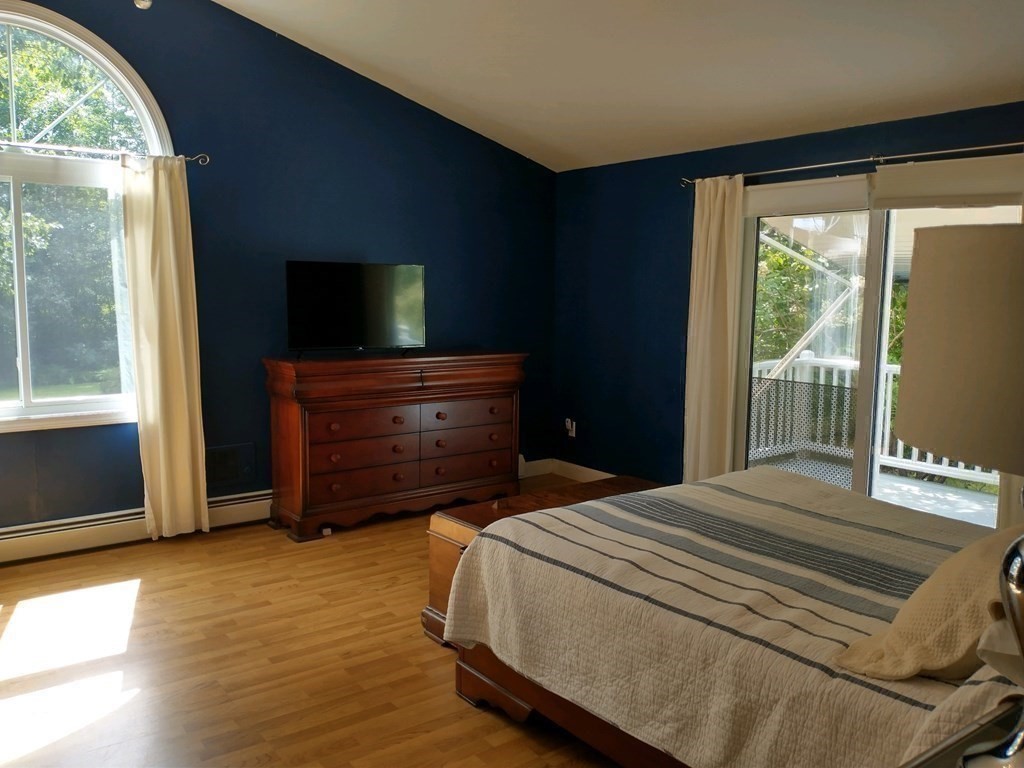 46 Apple Road Brimfield, MA 01010 - Photo 17 of 37 a bedroom with a bed and a television