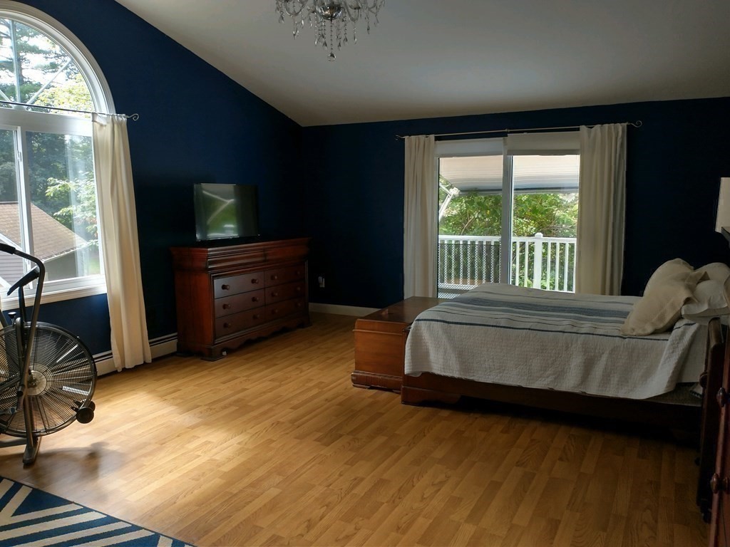 46 Apple Road Brimfield, MA 01010 - Photo 18 of 37 a bed sitting in a room next to a window