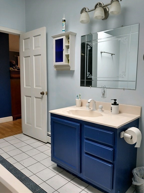 46 Apple Road Brimfield, MA 01010 - Photo 20 of 37 a bathroom with a sink and a mirror