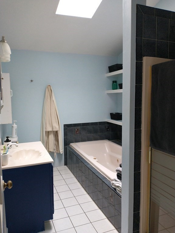 46 Apple Road Brimfield, MA 01010 - Photo 21 of 37 a bathroom with a bathtub and a sink