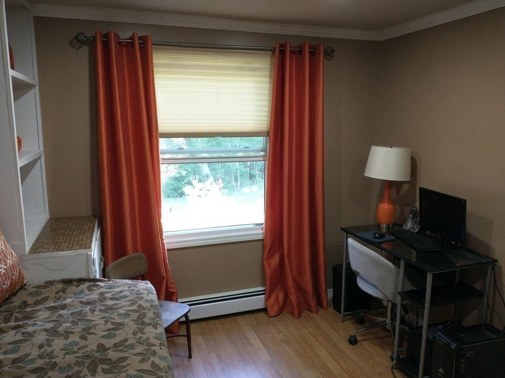 46 Apple Road Brimfield, MA 01010 - Photo 24 of 37 a bedroom with a bed and a window