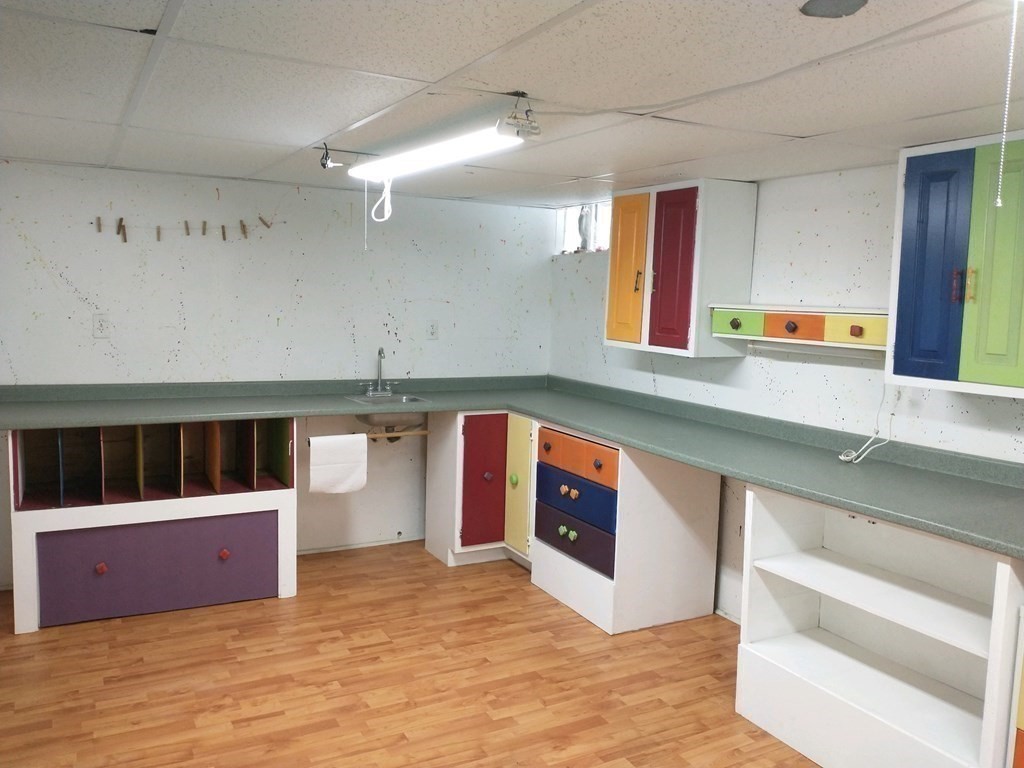 46 Apple Road Brimfield, MA 01010 - Photo 28 of 37 a kitchen with stainless steel appliances granite countertop a stove a sink and a microwave