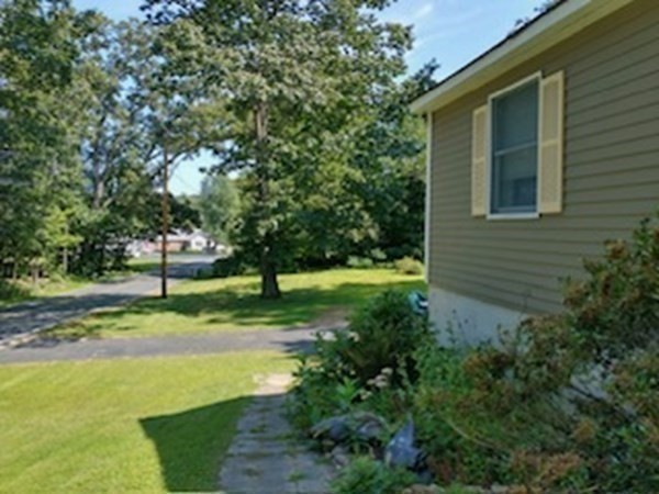 46 Apple Road Brimfield, MA 01010 - Photo 10 of 37 a view of a house with a yard
