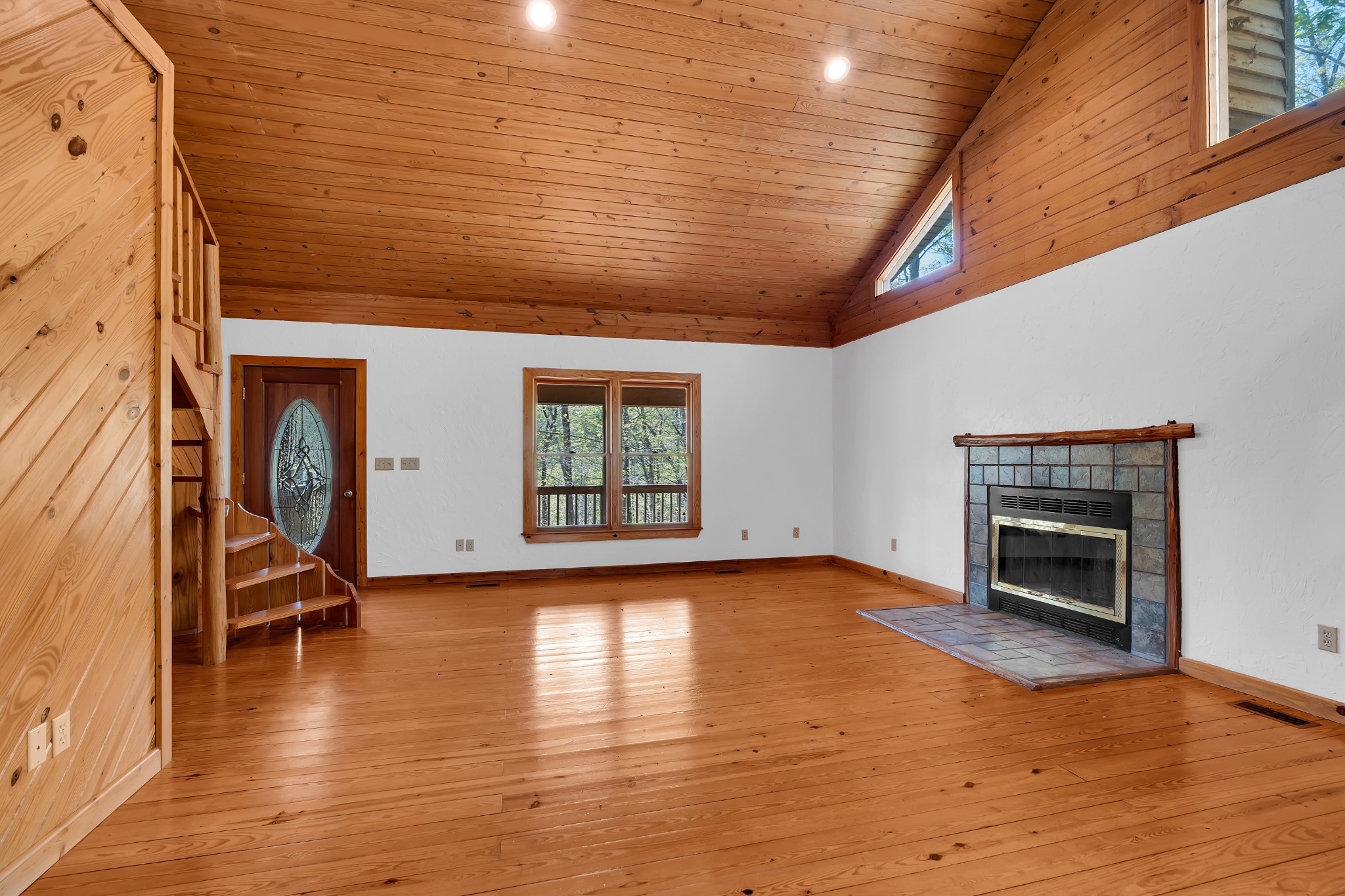 551 Shippmans Creek Road Wartrace, TN 37183 - Photo 13 of 75 wooden floor in an empty room with a fireplace