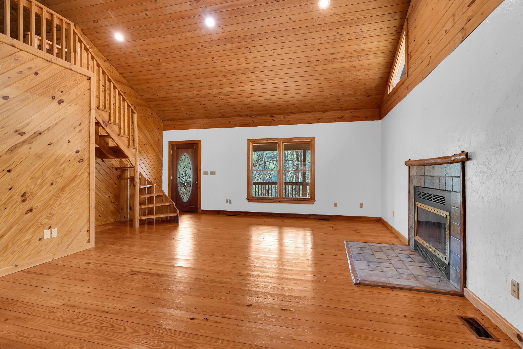 551 Shippmans Creek Road Wartrace, TN 37183 - Photo 14 of 75 a view of a livingroom with wooden floor and a large window