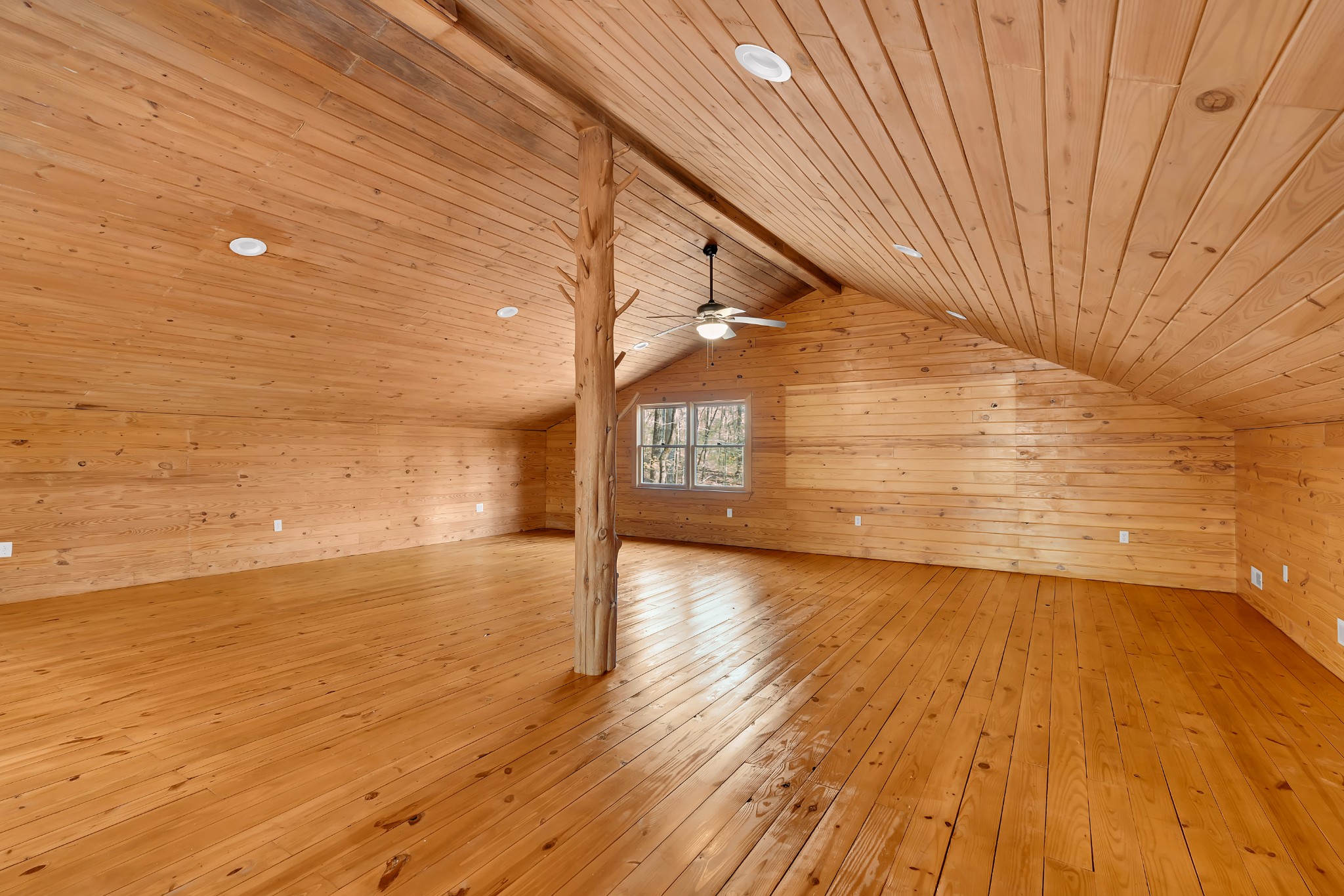 551 Shippmans Creek Road Wartrace, TN 37183 - Photo 23 of 75 a view of an empty room with wooden floor and a window