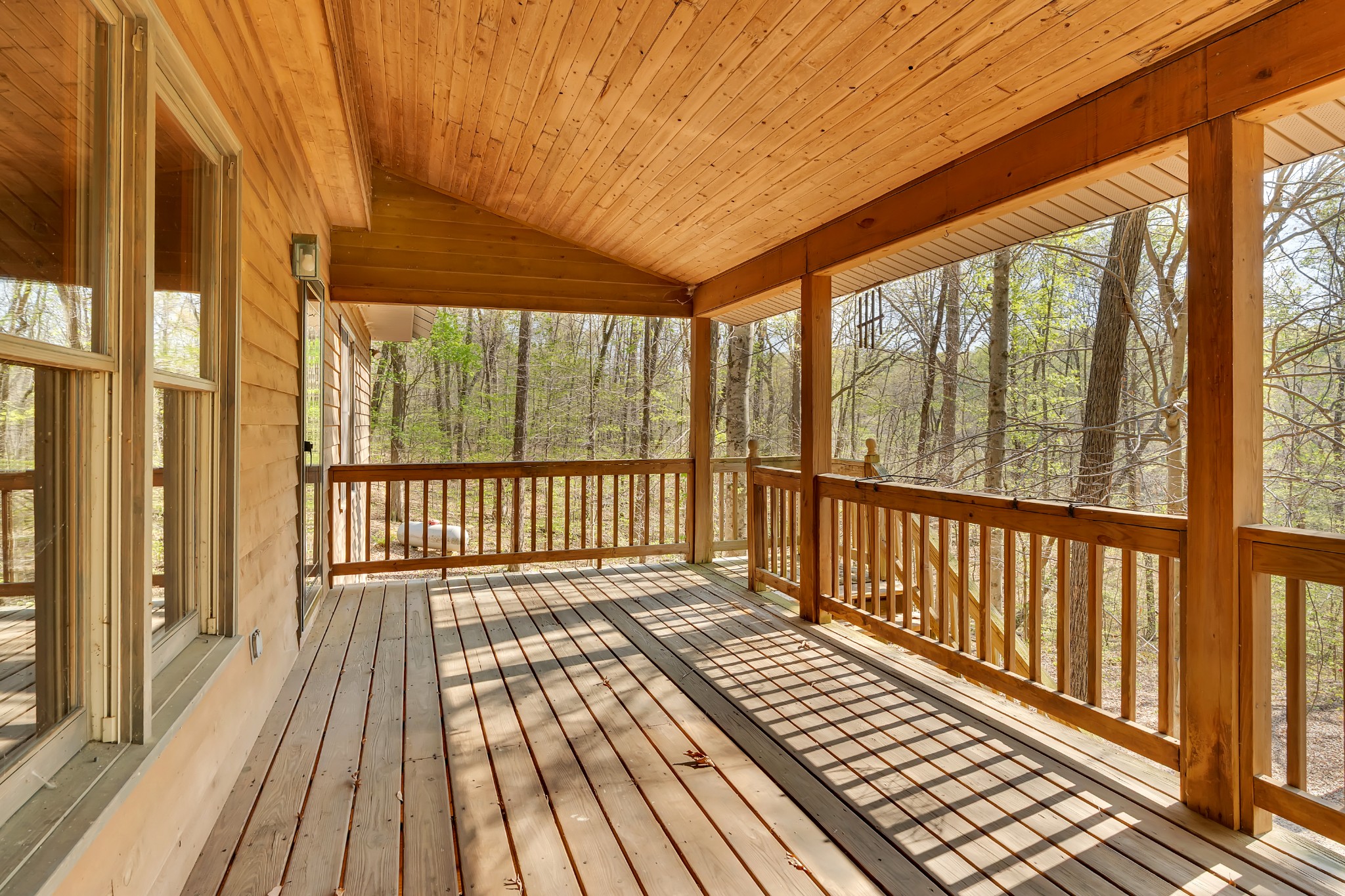 551 Shippmans Creek Road Wartrace, TN 37183 - Photo 25 of 75 a view of a wooden balcony with wooden floor