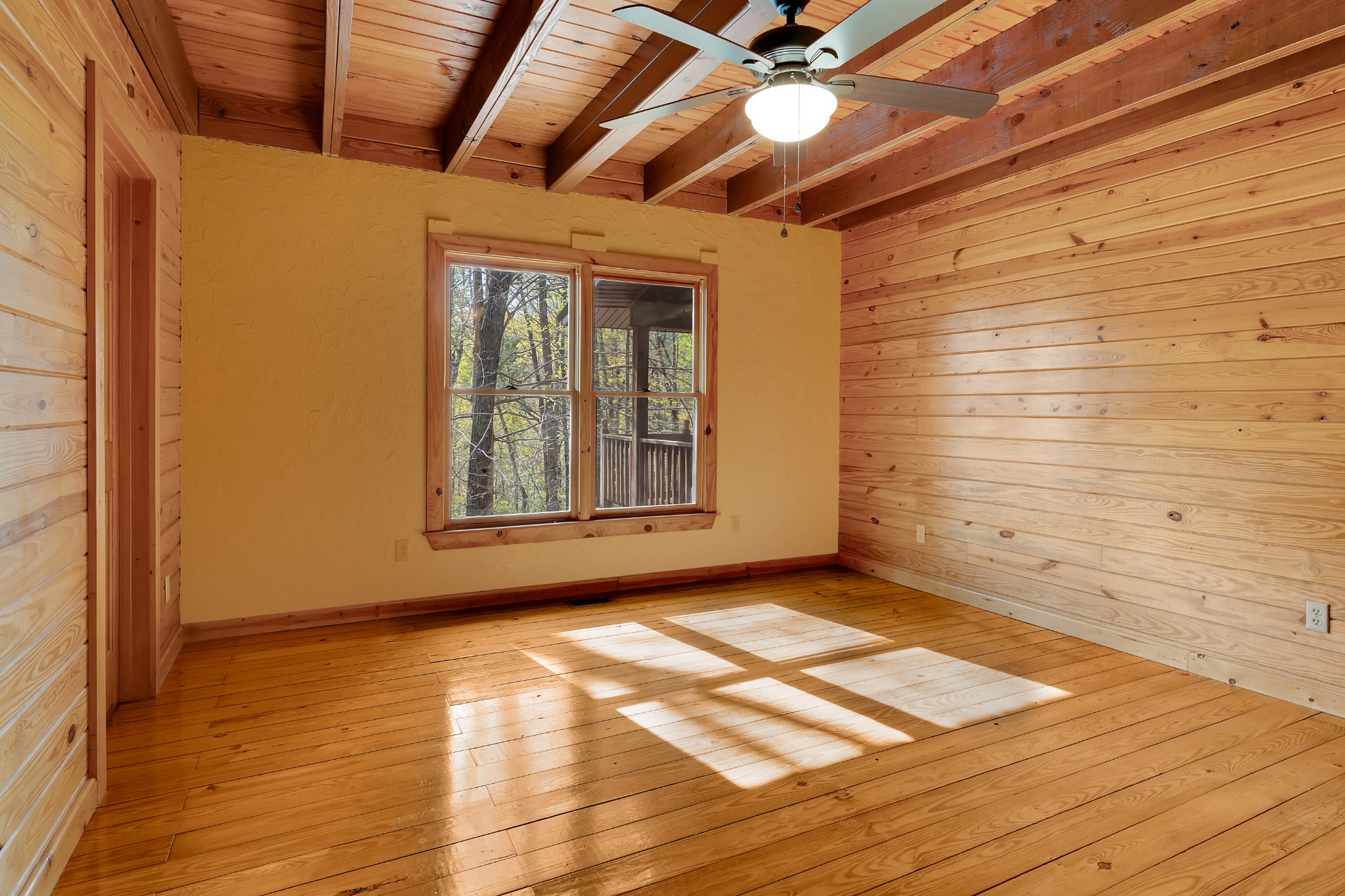 551 Shippmans Creek Road Wartrace, TN 37183 - Photo 27 of 75 a view of an empty room with wooden floor and a window