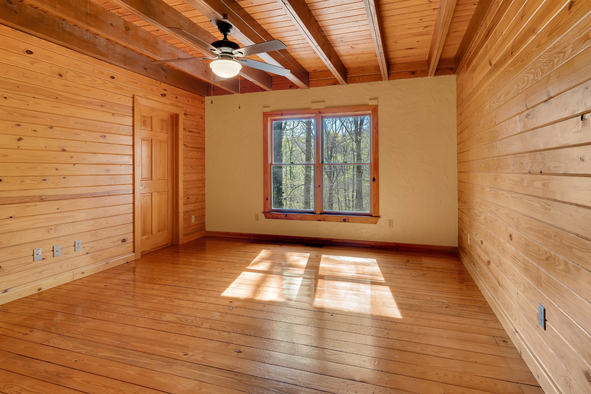 551 Shippmans Creek Road Wartrace, TN 37183 - Photo 28 of 75 a view of empty room with wooden floor and fan