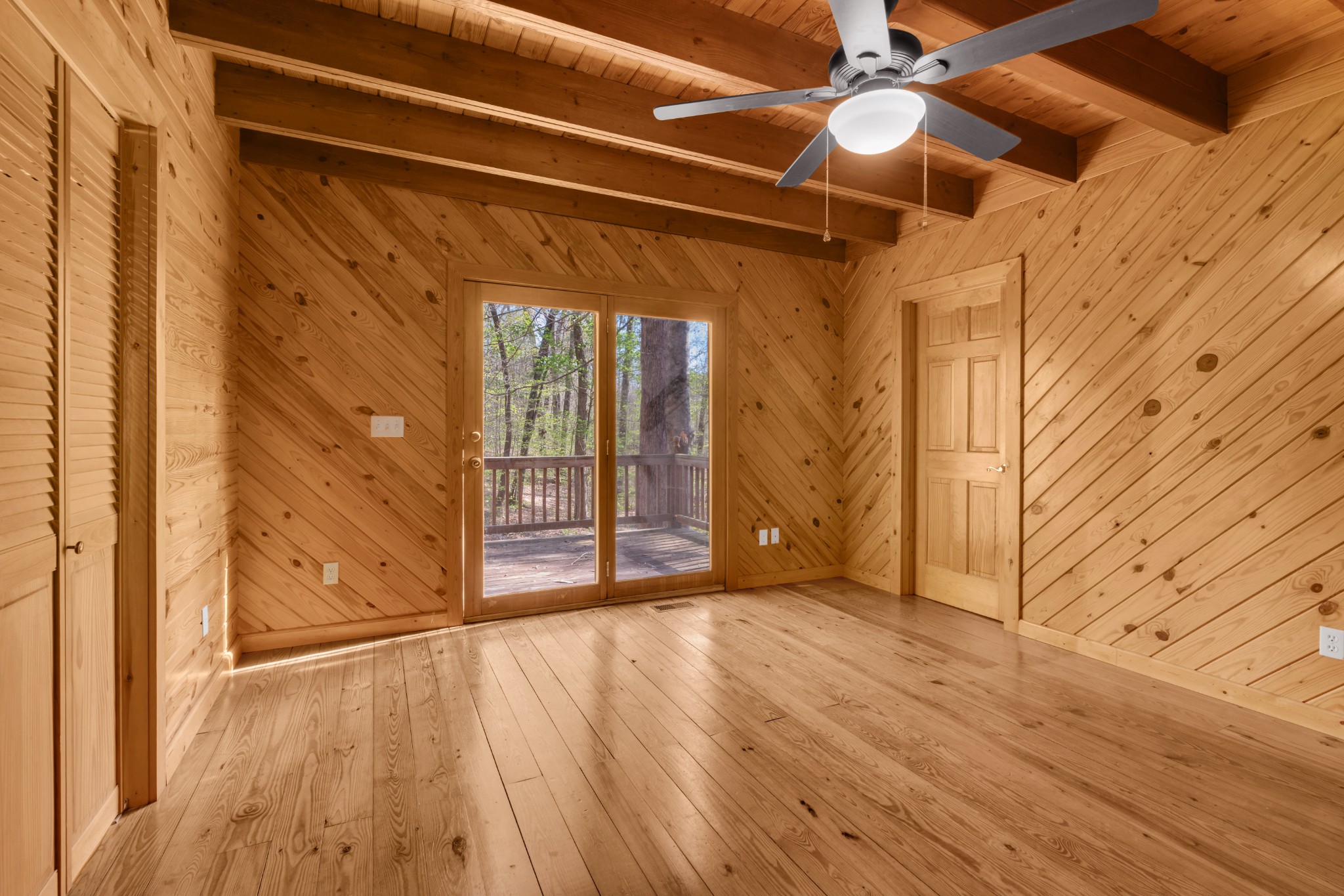551 Shippmans Creek Road Wartrace, TN 37183 - Photo 35 of 75 a view of an empty room with wooden floor and a window