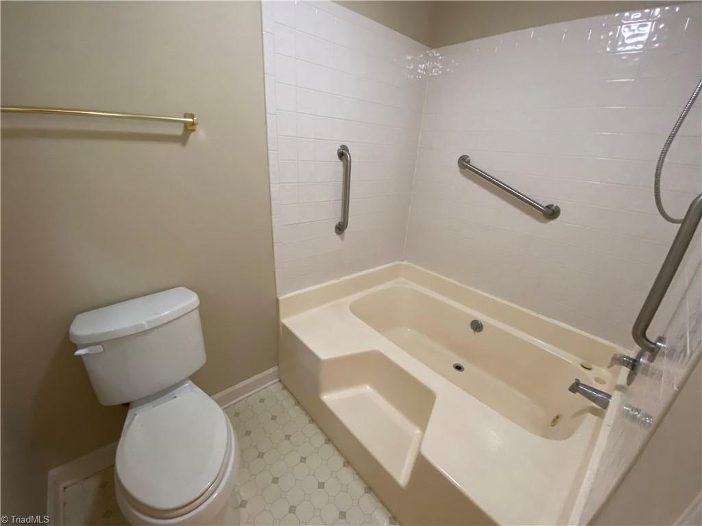 222 Jackson Road Mount Airy, NC 27030 - Photo 7 of 18 Primary bathroom on main has double vanity.