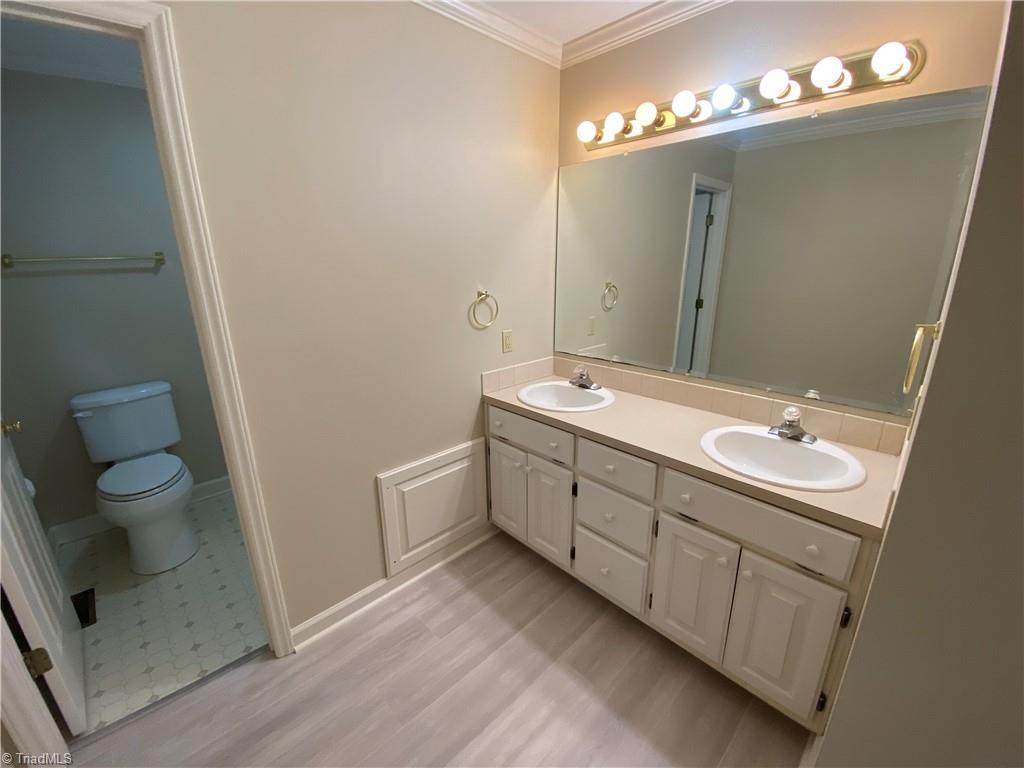 222 Jackson Road Mount Airy, NC 27030 - Photo 8 of 18 Primary bathroom on main has double vanity.