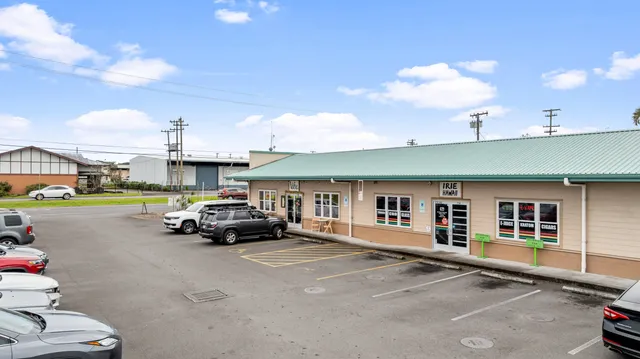 a car parked in front of a house