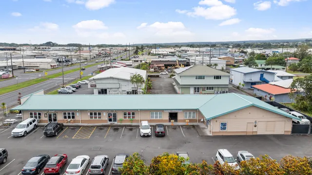 a view of a terrace with a table and chairs