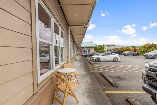 a view of a street with cars