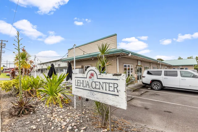 a view of a street with sitting area