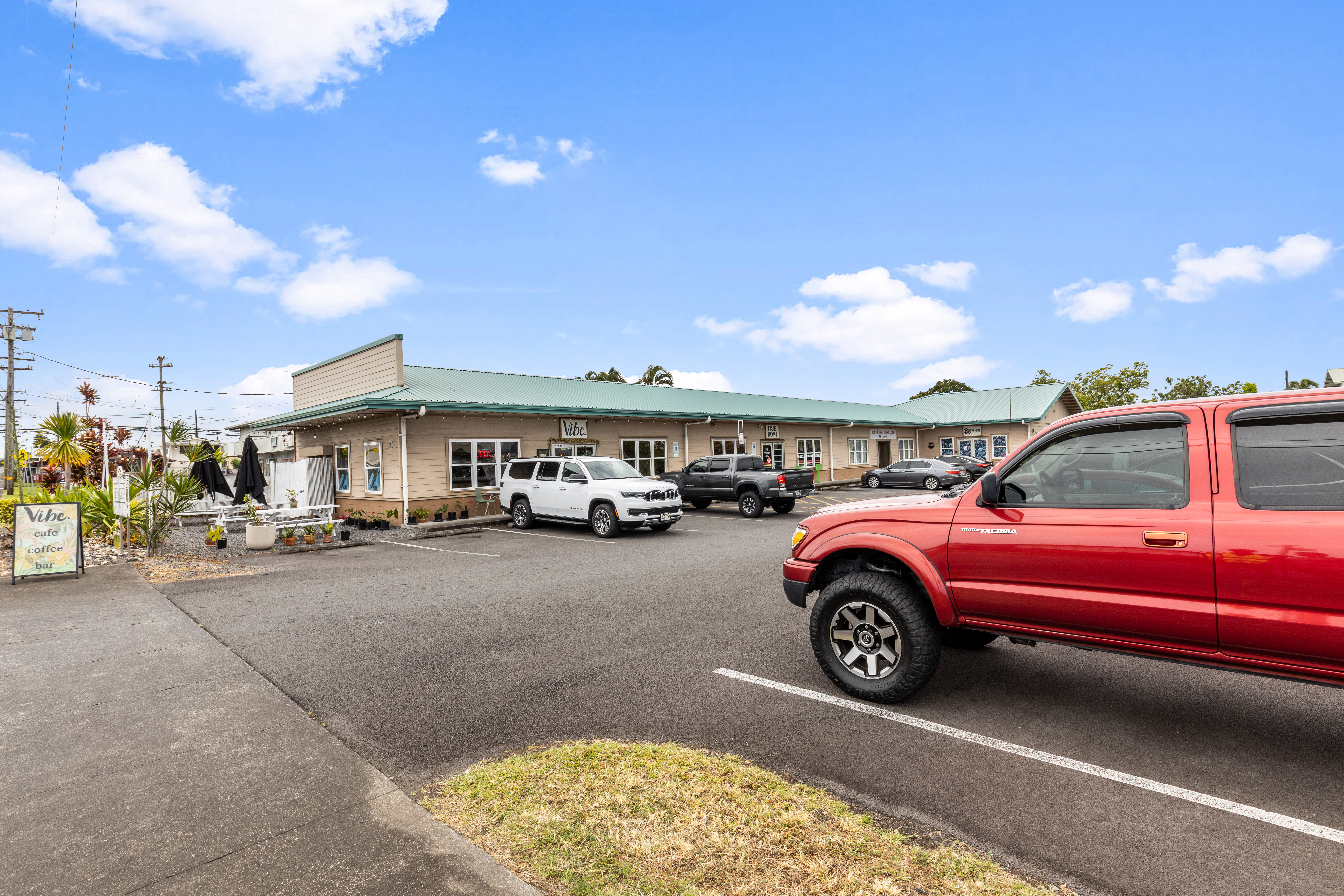 750 Kanoelehua Avenue, Unit 4 Hilo, HI 96720 - Photo 21 of 25 a car parked in garage of a