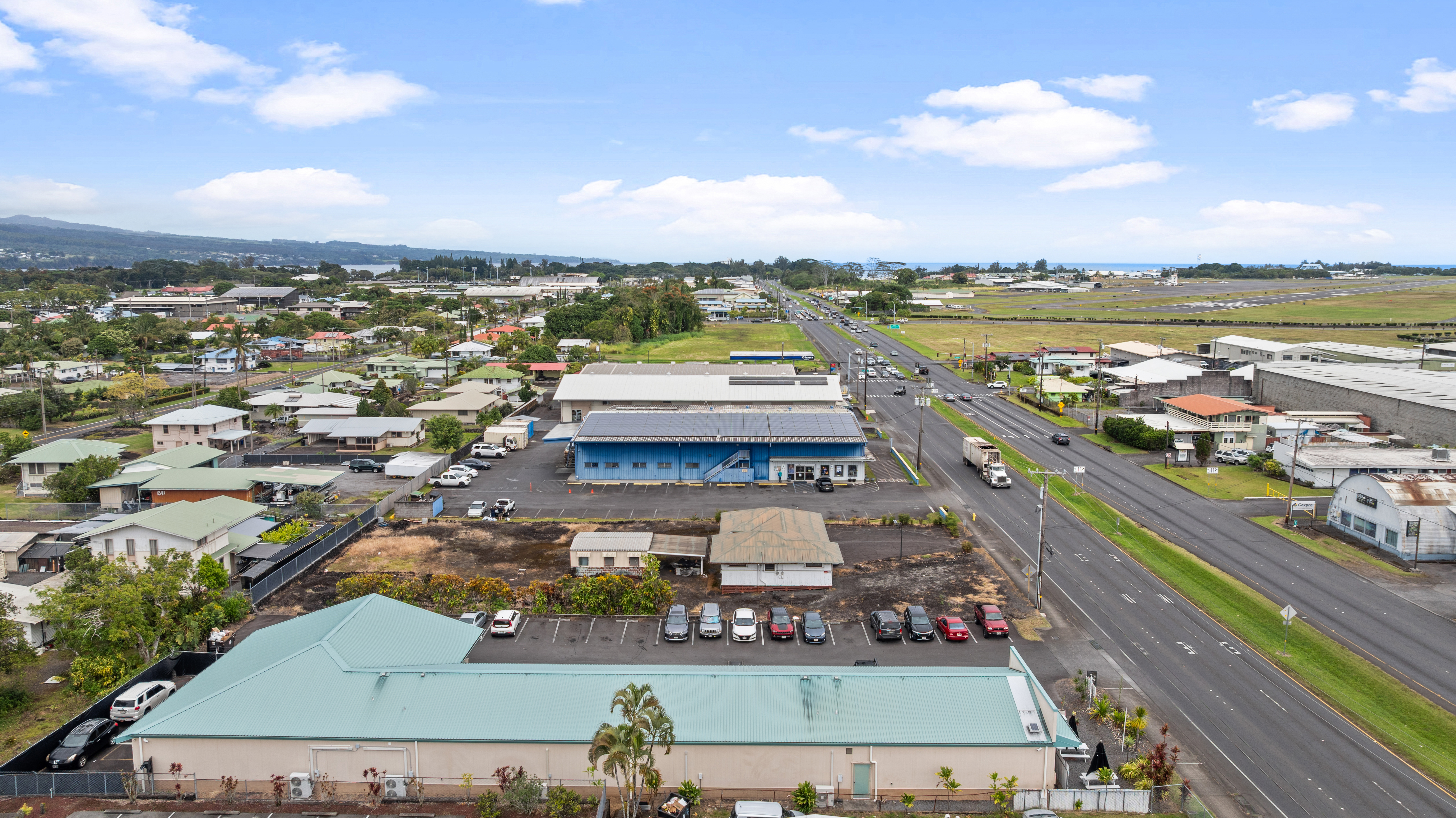 750 Kanoelehua Avenue, Unit 4 Hilo, HI 96720 - Photo 5 of 25 a view of a city with an ocean