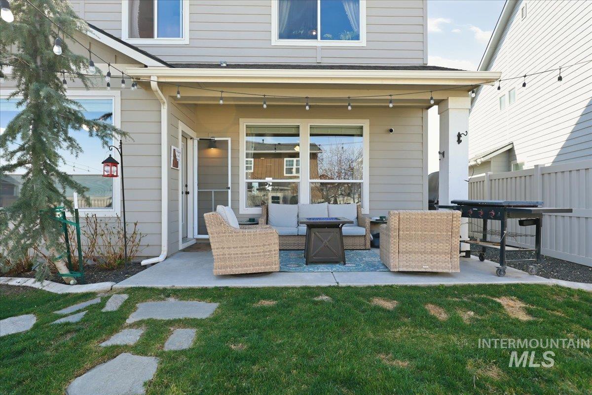13314 Bloomfield Drive Caldwell, ID 83607 - Photo 19 of 32 Rear view of property with a patio and an outdoor lounge area