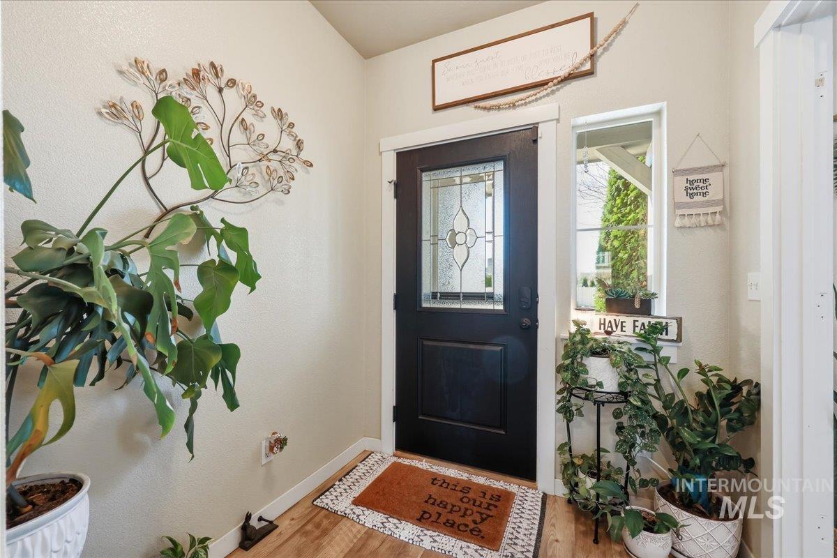 13314 Bloomfield Drive Caldwell, ID 83607 - Photo 2 of 32 Foyer featuring light wood finished floors and baseboards