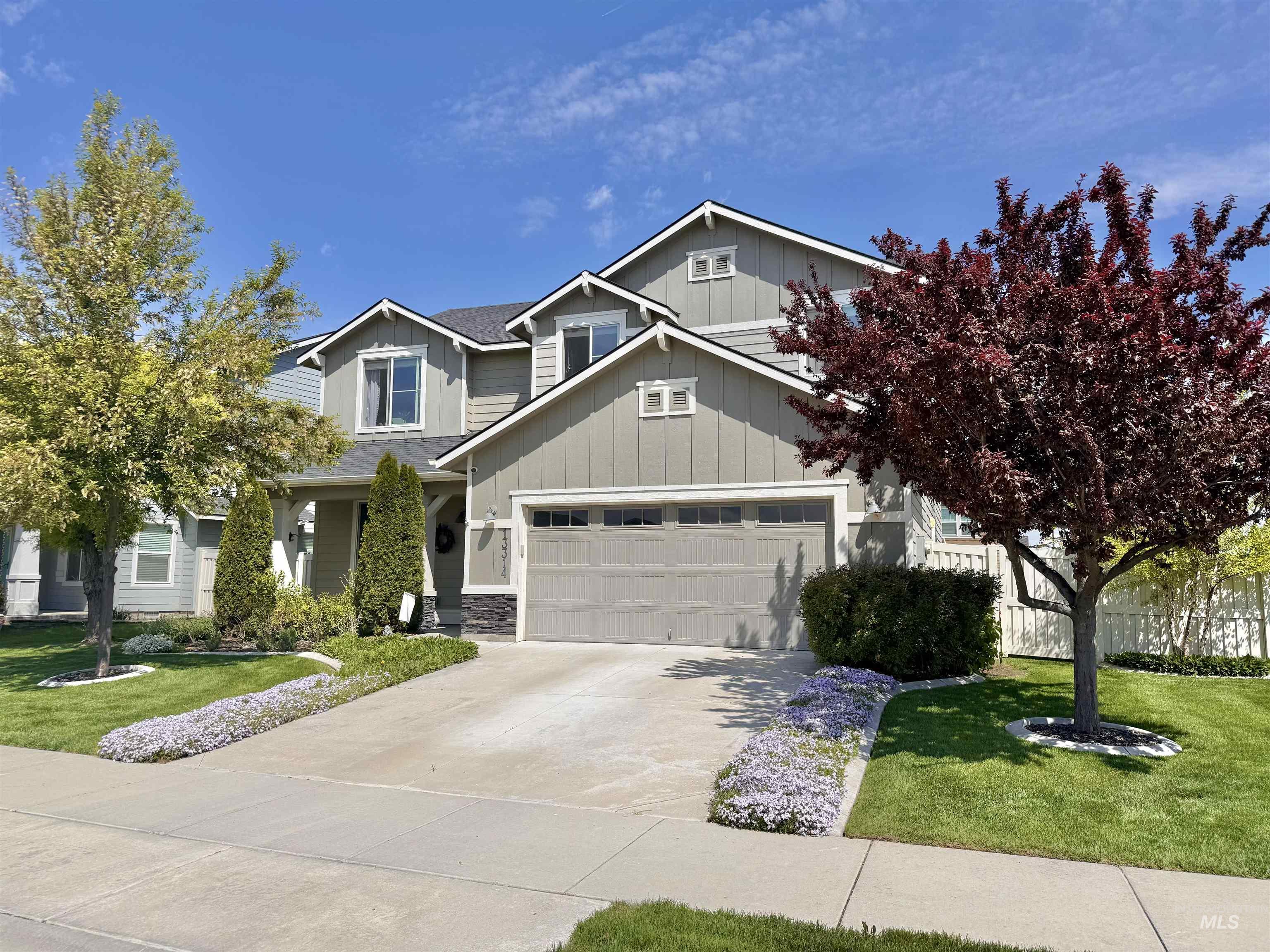 13314 Bloomfield Drive Caldwell, ID 83607 - Photo 30 of 32 Contemporary two-story residence featuring light gray siding and a stone accent facade