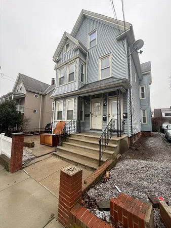 a front view of a house with patio