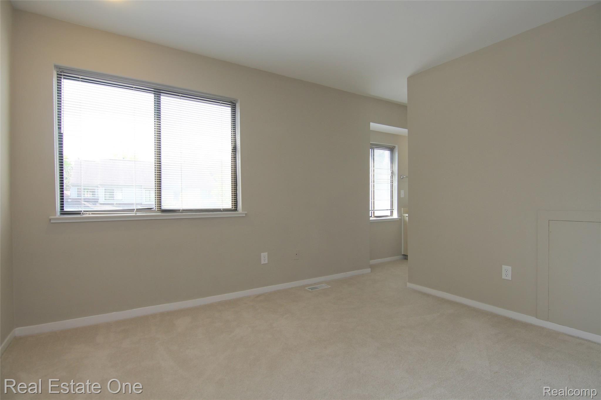 559 Harrow Court, Unit 39 Rochester, MI 48307 - Photo 10 of 19 jHarrow Ct Bedroom 1.jpg