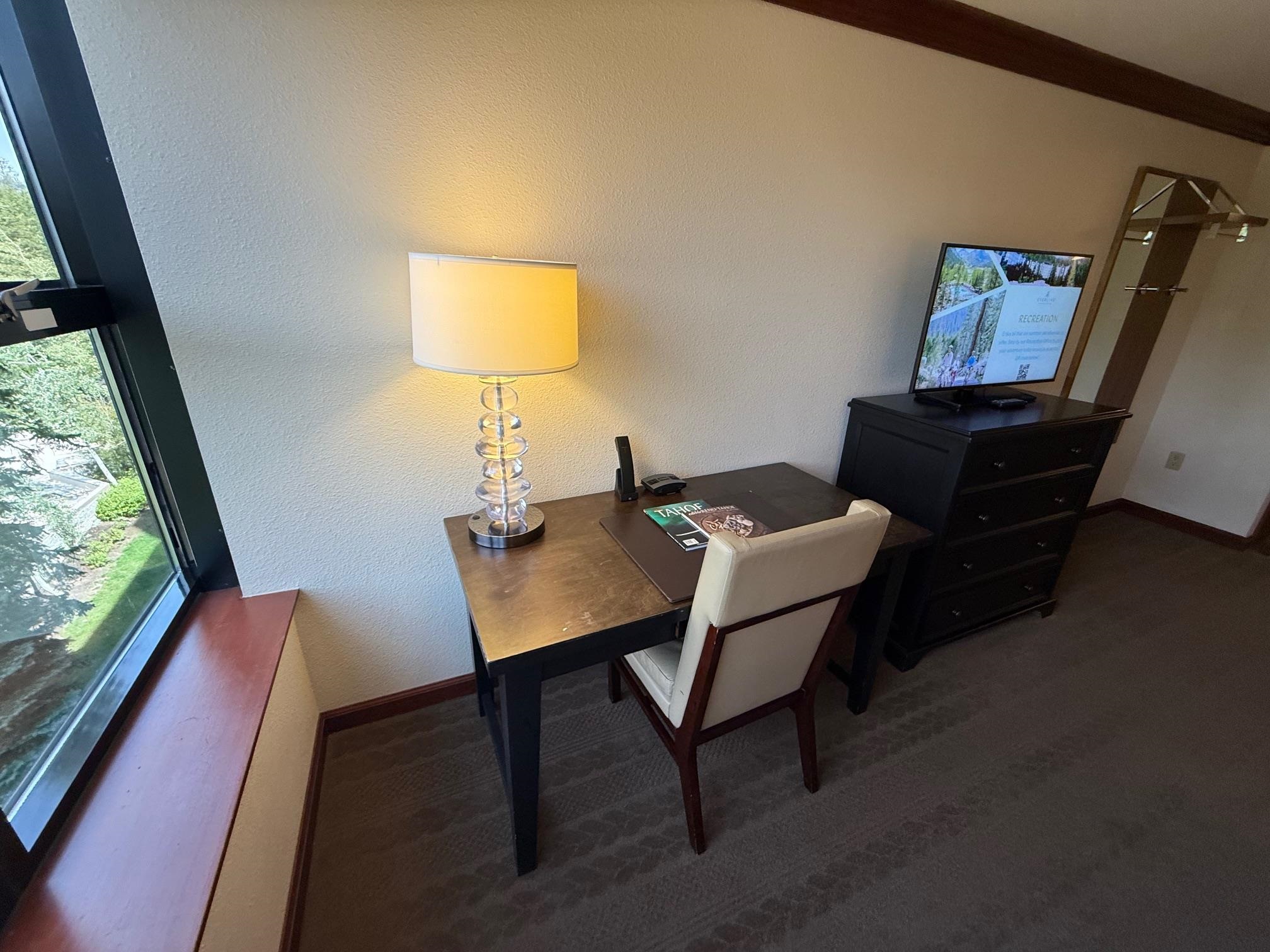 400 Resort Road, Unit 532 Olympic Valley, CA 96146 - Photo 15 of 21 a view of a workspace room with wooden floor windows