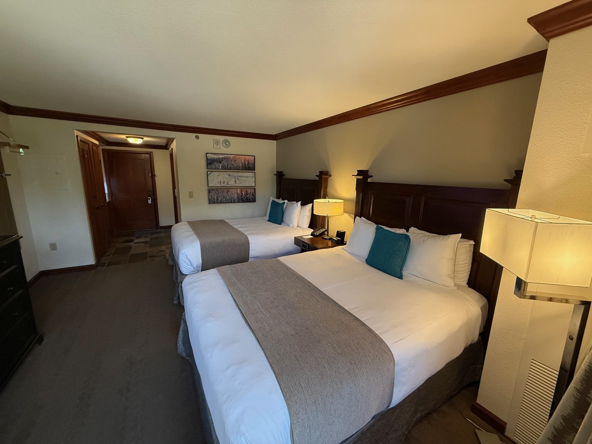 400 Resort Road, Unit 532 Olympic Valley, CA 96146 - Photo 4 of 21 a bed room with bed and mirror